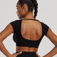Motion Seamless Open Back Short Sleeve Crop Top | Black